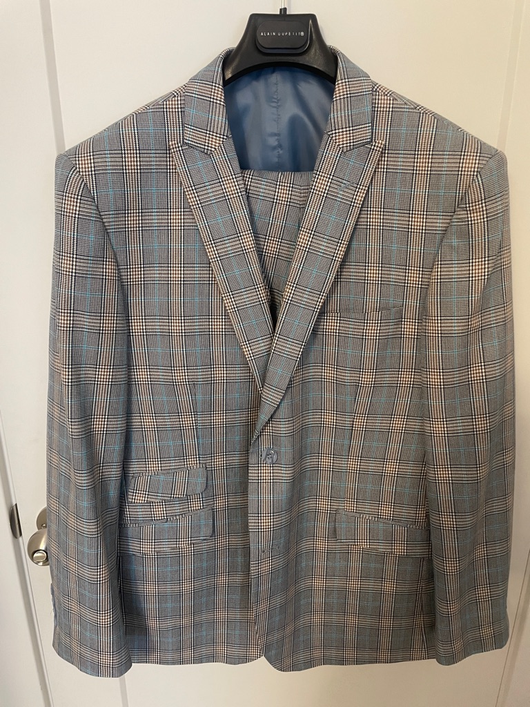 3-Piece Slim Fit Suit. Colors: Navy Blue, Aqua Blue, Tan, And White.